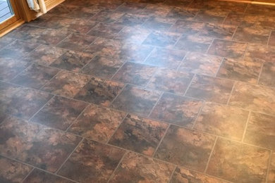 Inspiration for a mid-sized vinyl floor sunroom remodel in Minneapolis