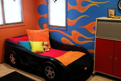 This is an example of a contemporary kids' bedroom for boys in Seattle with carpet.