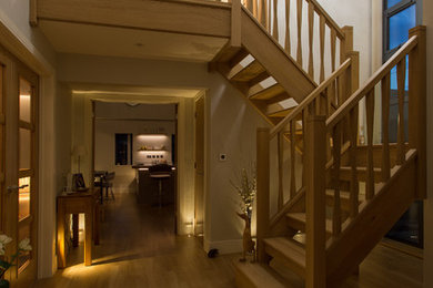 This is an example of a modern hallway in Hampshire.