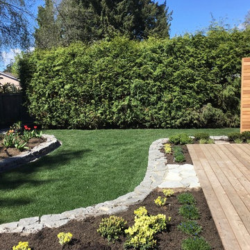 AFTER - Deck view detail with low stacked stone planter bed border
