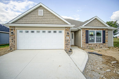 Example of a transitional garage design in Other