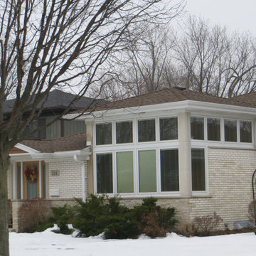 Brick Addition on back of quad level home and new Entrance in Front
