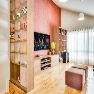 Medium sized contemporary enclosed home cinema in Other with orange walls, plywood flooring and a wall mounted tv.