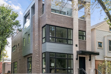 Example of a minimalist exterior home design in Chicago