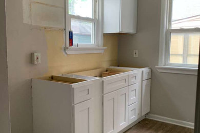 Inspiration for a laundry room remodel in Cleveland