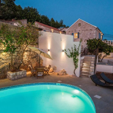 Restoration and conversion of stone house complex on Hvar island