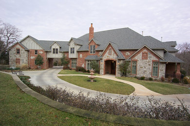 Huge gray two-story mixed siding exterior home photo in Oklahoma City
