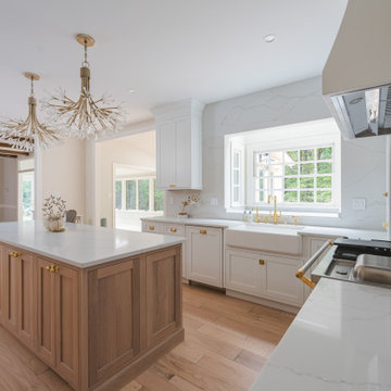 Château Charm: French-Inspired Kitchen Renovation with Plaster Hood Blue Stove a
