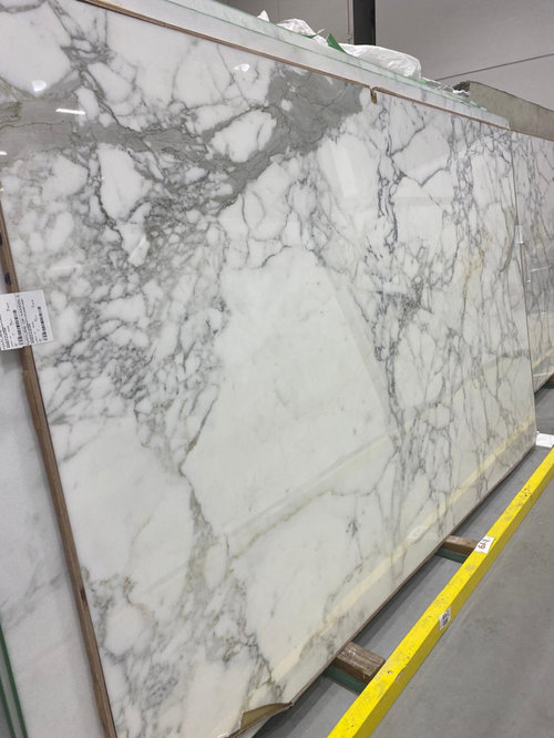 Help! what cabinet color to go with this calacatta marble?