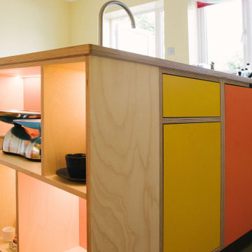 The Bradys - Orange and Yellow Plywood Kitchen
