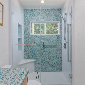 Turquoise Patterned Recycled Glass Inspires Guest Bathroom
