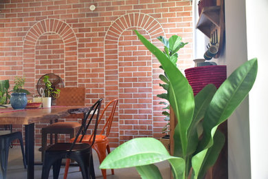 Inspiration for a tropical dining room remodel in Bengaluru