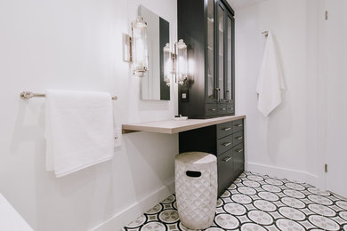 Inspiration for a mid-sized contemporary 3/4 white tile and ceramic tile porcelain tile and gray floor bathroom remodel in Montreal with flat-panel cabinets, white walls, medium tone wood cabinets, an undermount tub, a two-piece toilet, an undermount sink, quartz countertops and white countertops