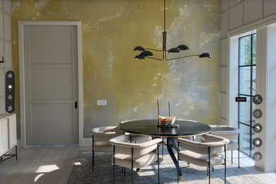 Example of a large minimalist great room design in Houston with green walls