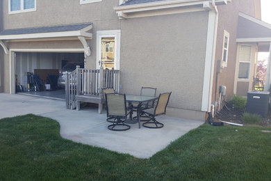 Example of a mid-sized arts and crafts backyard patio design in Kansas City