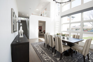 Example of a trendy dining room design in Denver