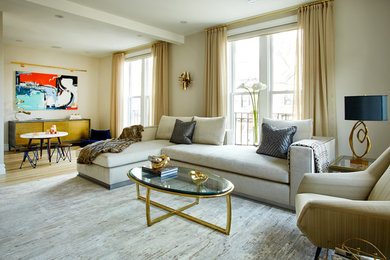 Inspiration for a large transitional formal and open concept light wood floor living room remodel in New York with gray walls and a wall-mounted tv