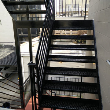 Wicker Park back metal porch rust removal, priming and painting