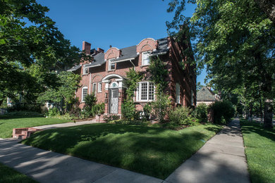 This is an example of a mid-sized traditional exterior in Denver.