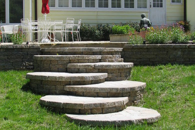 Inspiration for a full sun backyard brick garden path in Other.