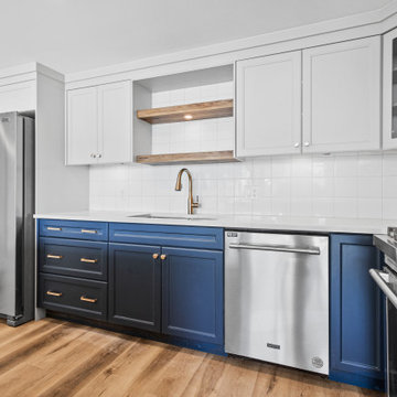Elegant interior renovation with eye catching blue kitchen