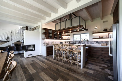 Idee per una grande cucina industriale con lavello a doppia vasca, ante a persiana, ante con finitura invecchiata, top in cemento, paraspruzzi multicolore, paraspruzzi con piastrelle di cemento, elettrodomestici in acciaio inossidabile, pavimento in gres porcellanato, pavimento multicolore e top grigio