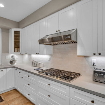 Modern Carlsbad Kitchen Corner with Designer Faucet and Ample Storage
