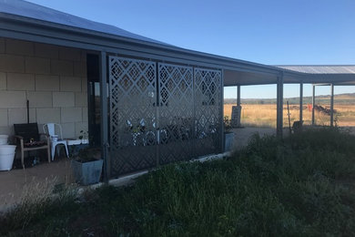 This is an example of a large country screened-in verandah in Newcastle - Maitland.