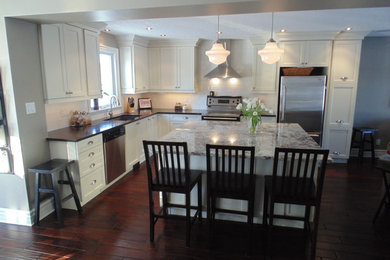 This is an example of a kitchen in Toronto with granite benchtops.