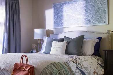Bedroom - mid-sized traditional master medium tone wood floor bedroom idea in Calgary with beige walls, a standard fireplace and a wood fireplace surround