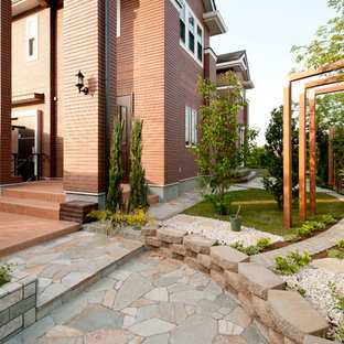 横浜のアジアンスタイルのおしゃれな横庭のテラス (日よけなし) の写真