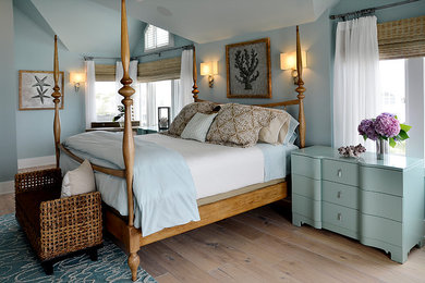 Bedroom - large coastal master light wood floor bedroom idea in Philadelphia with blue walls