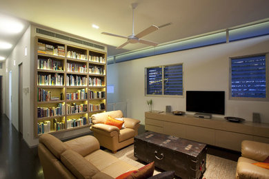 Design ideas for a modern family room in Brisbane.