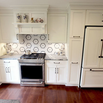 White Cabinets, Grey Countertops and Edgy Tile Backsplash