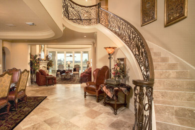Inspiration for a timeless travertine floor foyer remodel in Houston