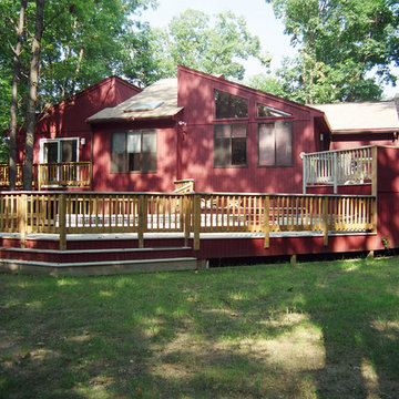 Multi-level deck with enclosed lap pool