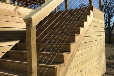 Elegant staircase photo in Other