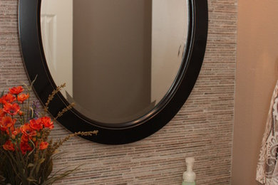 Example of a transitional powder room design in Houston