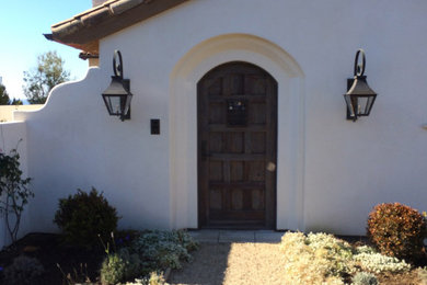 Example of a tuscan entryway design in Other
