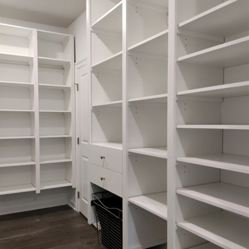 Galley Style Walk-In Master Closet in Wayne PA back wall