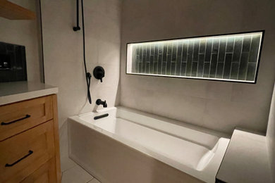 Example of a small trendy master green tile single-sink bathroom design in Los Angeles with shaker cabinets, light wood cabinets, quartz countertops, white countertops and a built-in vanity