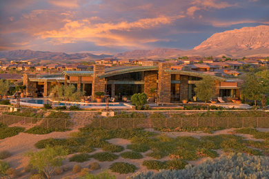 Example of a tuscan exterior home design in Las Vegas