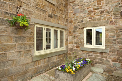 stone house window installation