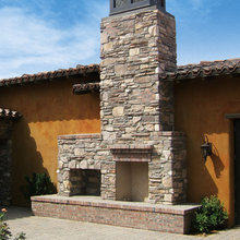 stone veneer chimney and foundation