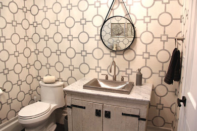 Inspiration for a transitional powder room remodel in Orange County