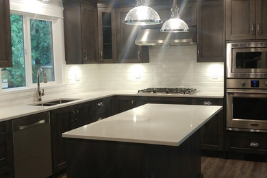 Example of a transitional kitchen design in Vancouver
