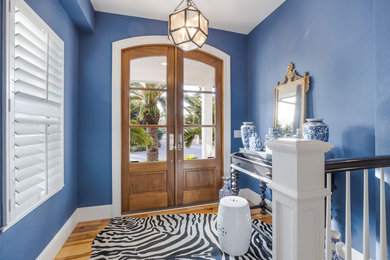 Inspiration for a coastal entryway remodel in Miami