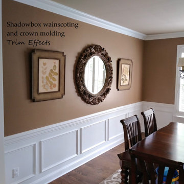 Shadow box wainscoting with double chair rail and crown molding.