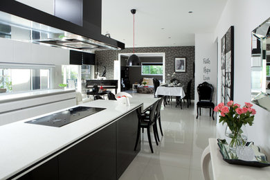This is an example of a contemporary galley eat-in kitchen in Brisbane.