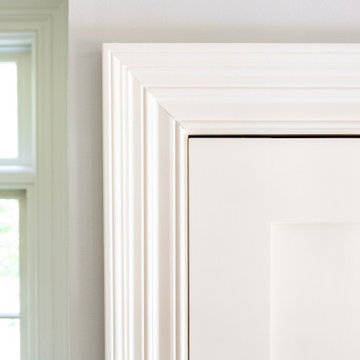 Refined Trimwork and Sunlit Entryway